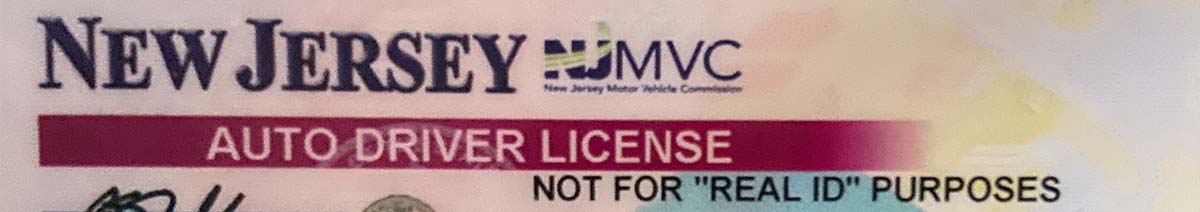 This is an example of a standard driver's license issued in New Jersey, the words: Not for "REAL ID" purposes is printed at the top. 