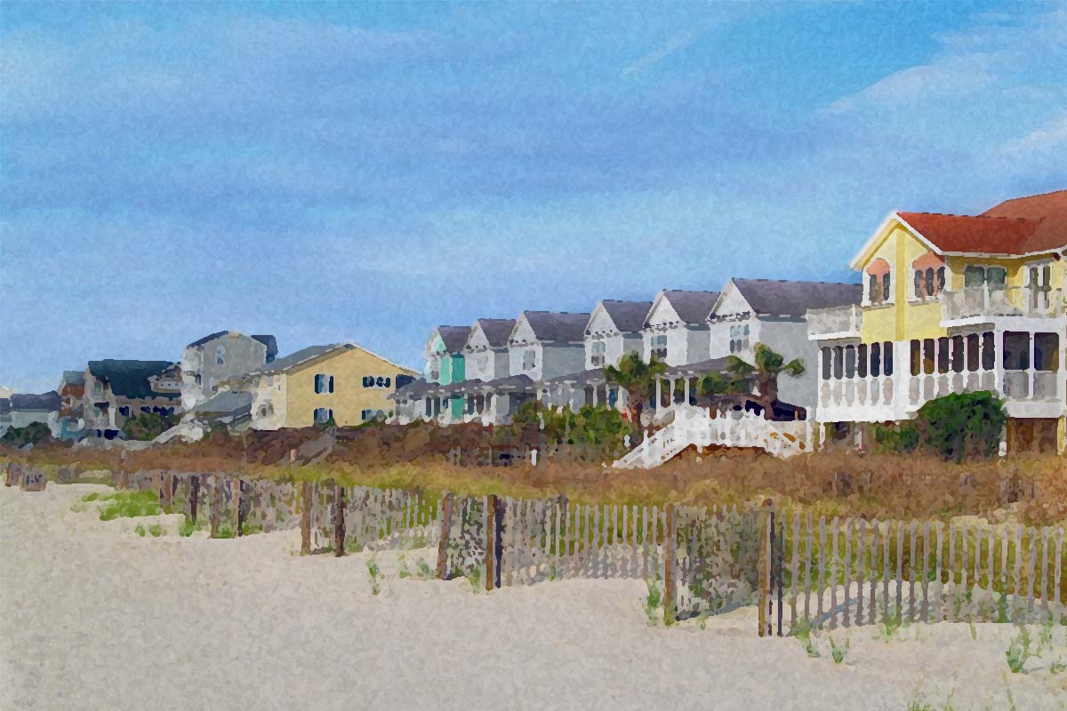 A row of vacation rental homes on a beach illustrating an article about a missing security deposit refund.