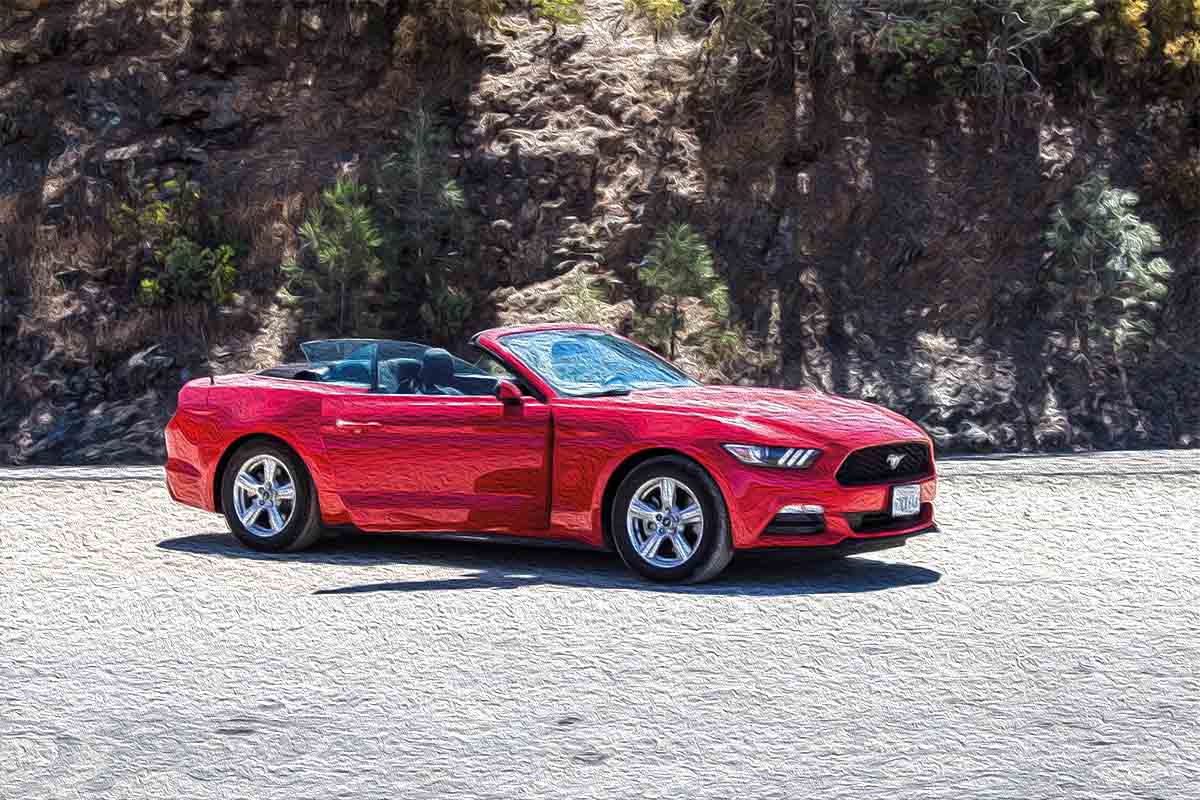 Red Mustang convertible rental car.