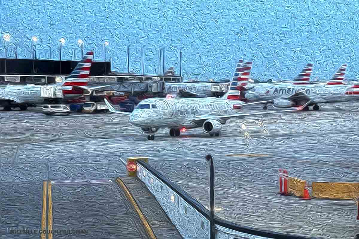American Airlines ran over luggage copy American Airlines aircraft and luggage carts on the tarmac, Did a plane run over this passenger's bag?