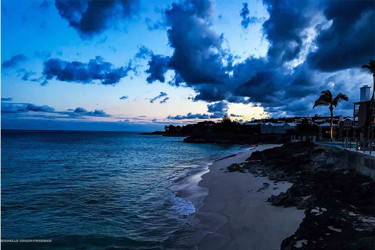Summer travel scams, avoid scams this summer, sunset in the summer