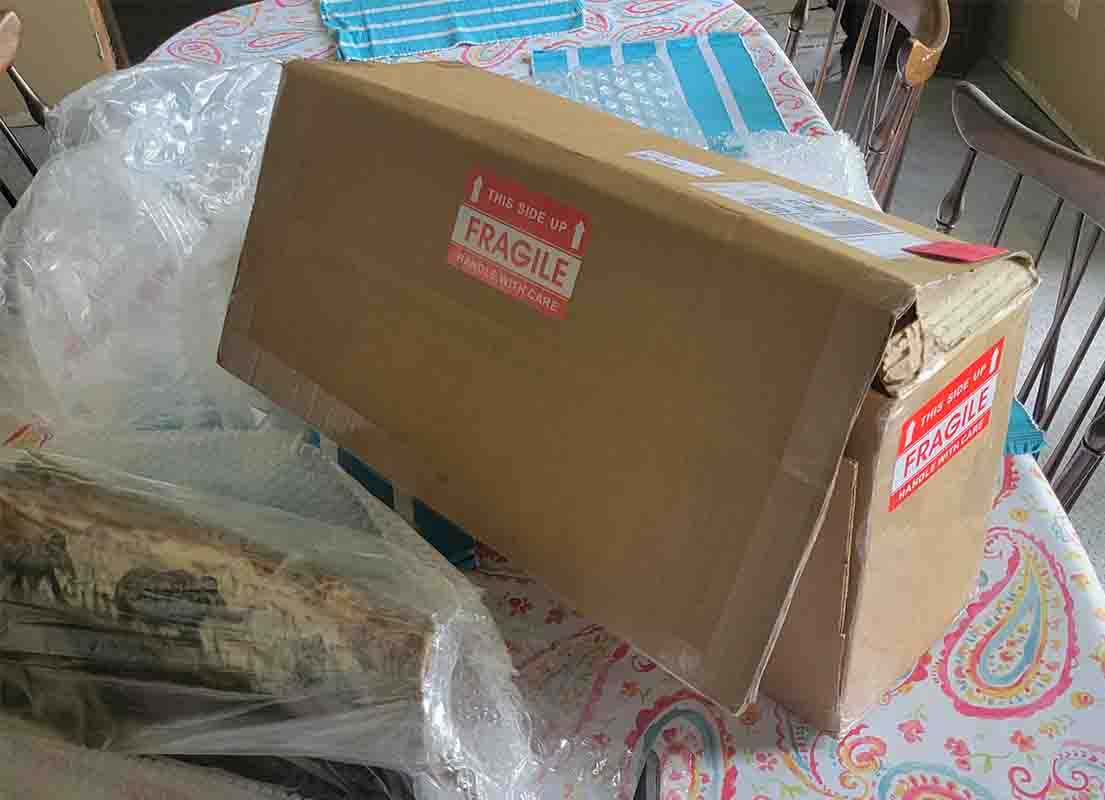 fragile UPS doesn't care Busted box, UPS smashed this package
